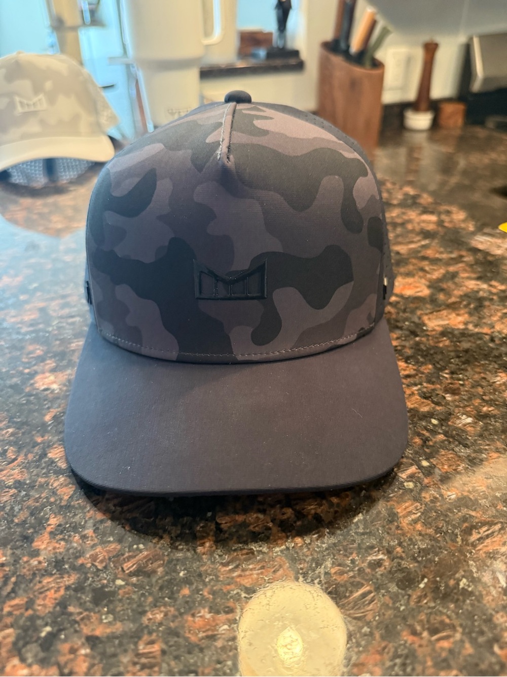 Black melin hat. Unworn